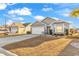 Charming single-story home featuring a well-maintained lawn, two-car garage, and inviting curb appeal at 223 Obi Lane, Surfside Beach, SC 29575
