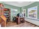 Inviting office with built-in bench, desk, bookshelves, and sunny windows at 223 Obi Lane, Surfside Beach, SC 29575
