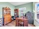 Cozy office space with built-in storage, a safe, desk, and plenty of natural light at 223 Obi Lane, Surfside Beach, SC 29575