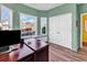 Inviting office features a built-in bench, large windows, and a closet at 223 Obi Lane, Surfside Beach, SC 29575