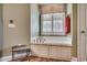This bathroom has a soaking tub, white cabinets and neutral paint at 232 Wahee Pl., Conway, SC 29527