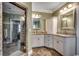 This bathroom has a glass shower, granite countertops and white cabinets at 232 Wahee Pl., Conway, SC 29527