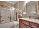 This bathroom has a shower/tub combo, granite countertops and wood cabinets at 232 Wahee Pl., Conway, SC 29527
