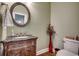 Half bathroom with a decorative vanity, mirror, and a vase with flowers at 232 Wahee Pl., Conway, SC 29527