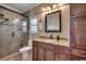 Updated bathroom featuring a stand up shower, tile flooring, and granite countertops at 232 Wahee Pl., Conway, SC 29527