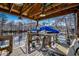 Relaxing waterfront dock featuring a covered boat lift, table and chairs, for enjoying waterfront activities at 232 Wahee Pl., Conway, SC 29527