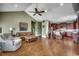 Open-concept living area featuring hardwood floors, vaulted ceilings, and natural light at 232 Wahee Pl., Conway, SC 29527
