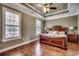 Bedroom with hardwood floors, large windows and ceiling with trim at 232 Wahee Pl., Conway, SC 29527