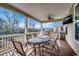 View of the porch featuring a ceiling fan, grill and outdoor dining set at 232 Wahee Pl., Conway, SC 29527