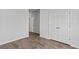 Cozy bedroom featuring hardwood floors and neutral walls at 263 Warner Crossing Way, Loris, SC 29569