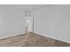 Spacious bedroom with wood flooring and a doorway at 263 Warner Crossing Way, Loris, SC 29569