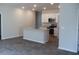 Eat-in kitchen featuring stainless steel appliances, granite counters, and a central island at 263 Warner Crossing Way, Loris, SC 29569