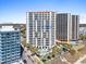 Resort-style condo complex featuring a pool, palm trees, and beach access at 2700 N Ocean Blvd. # 1053, Myrtle Beach, SC 29577