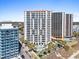 Resort-style condo complex featuring a pool, palm trees, and beach access at 2700 N Ocean Blvd. # 1053, Myrtle Beach, SC 29577