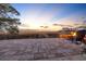 Enjoy the evening on the stone patio with a cozy fire pit and scenic views of the marsh at 3 Half Shell Ct., Pawleys Island, SC 29585