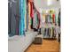 Walk-in closet featuring organized shelving and rods for ample storage of clothing and accessories at 3 Half Shell Ct., Pawleys Island, SC 29585
