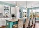 Stylish kitchen with modern cabinetry, a center island with seating, and a view of the outdoors at 3 Half Shell Ct., Pawleys Island, SC 29585