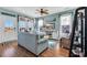 Inviting living room featuring coastal decor, natural light, and comfortable seating at 3 Half Shell Ct., Pawleys Island, SC 29585