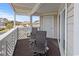 Relax on this peaceful outdoor balcony with patio seating, accessible from inside at 300 Shorehaven Dr. # W-3, North Myrtle Beach, SC 29582
