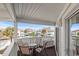Enjoy beautiful community views from the balcony furnished with a table and four chairs at 300 Shorehaven Dr. # W-3, North Myrtle Beach, SC 29582