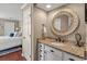 Bathroom featuring a stylish vanity with granite counters and a decorative mirror enhancing the space at 300 Shorehaven Dr. # W-3, North Myrtle Beach, SC 29582