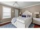 Cozy bedroom with a ceiling fan, nice white furniture set, and natural light at 300 Shorehaven Dr. # W-3, North Myrtle Beach, SC 29582