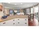 Open kitchen with granite countertops and white cabinets connected to the living room at 300 Shorehaven Dr. # W-3, North Myrtle Beach, SC 29582