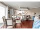 Bright living room featuring a dining area and a kitchen with stainless steel appliances at 300 Shorehaven Dr. # W-3, North Myrtle Beach, SC 29582