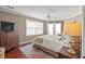 Comfortable main bedroom with ceiling fan, dresser, and cozy decor, creating a serene retreat at 300 Shorehaven Dr. # W-3, North Myrtle Beach, SC 29582