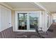 Covered patio area with outdoor seating, ideal for relaxing and enjoying the view at 300 Shorehaven Dr. # W-3, North Myrtle Beach, SC 29582