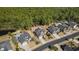 Aerial view of a residential neighborhood showcases homes with pools and mature landscaping at 3120 Bayhaven Dr., Myrtle Beach, SC 29579