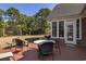 Outdoor patio includes outdoor furniture, a view of the yard, and access to the home at 3120 Bayhaven Dr., Myrtle Beach, SC 29579