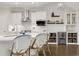 Bright modern kitchen with white cabinets, stainless steel appliances, and pendant lighting at 3120 Bayhaven Dr., Myrtle Beach, SC 29579
