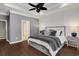 Large primary bedroom offers a tray ceiling, neutral decor, and an ensuite bathroom at 3120 Bayhaven Dr., Myrtle Beach, SC 29579