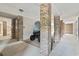 Common area storage with brick columns and gravel flooring at 310 5Th Ave. N # 206, Surfside Beach, SC 29575