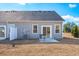 A partially fenced backyard with a small patio area, ready for outdoor enjoyment and personalization at 316 Brackish Dr. # 316, Myrtle Beach, SC 29588