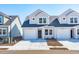 Charming new construction townhome with light gray siding, dark roof, and a one-car garage at 316 Brackish Dr. # 316, Myrtle Beach, SC 29588