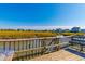 Scenic view from the dock overlooking the marsh and community homes beyond the waterway at 320 Salt Marsh Circle # 8-B, Pawleys Island, SC 29585