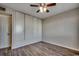 Cozy bedroom featuring hardwood floors, ceiling fan, and large closet at 3555 Highway 544 # 4-C, Conway, SC 29526