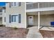 Two-story condo featuring vinyl siding, a white door and balcony, and dark shutters on the window at 3555 Highway 544 # 4-C, Conway, SC 29526