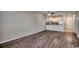 Spacious living room features wood floors and connects to the kitchen at 3555 Highway 544 # 4-C, Conway, SC 29526