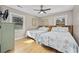 Bright bedroom with two beds, hardwood floors, and natural light at 401 25Th Ave. S, North Myrtle Beach, SC 29582