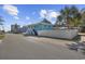 Charming two-story home with a white fence and stairs leading to the main level at 401 25Th Ave. S, North Myrtle Beach, SC 29582