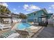 Backyard pool area, complete with lounge chairs and covered gazebos for relaxing in the shade at 401 25Th Ave. S, North Myrtle Beach, SC 29582