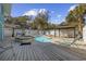 Private pool area with a hot tub, gazebos, lounge chairs, and a spacious deck at 401 25Th Ave. S, North Myrtle Beach, SC 29582