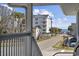 Street view from a balcony showing a beach access and surrounding neighborhood at 401 25Th Ave. S, North Myrtle Beach, SC 29582