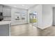 Dining area off kitchen has large windows and sliding door to backyard at 4295 Falls Oaks St., Myrtle Beach, SC 29579
