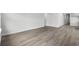 Open living room with a neutral palette and modern vinyl floors at 4295 Falls Oaks St., Myrtle Beach, SC 29579