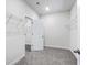 Walk-in closet with carpet flooring and wire shelving for organization at 4295 Falls Oaks St., Myrtle Beach, SC 29579