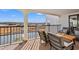 Relax on this balcony featuring comfortable chairs and views of the waterway at 4440 Nassau Ct. # D-507, Little River, SC 29566